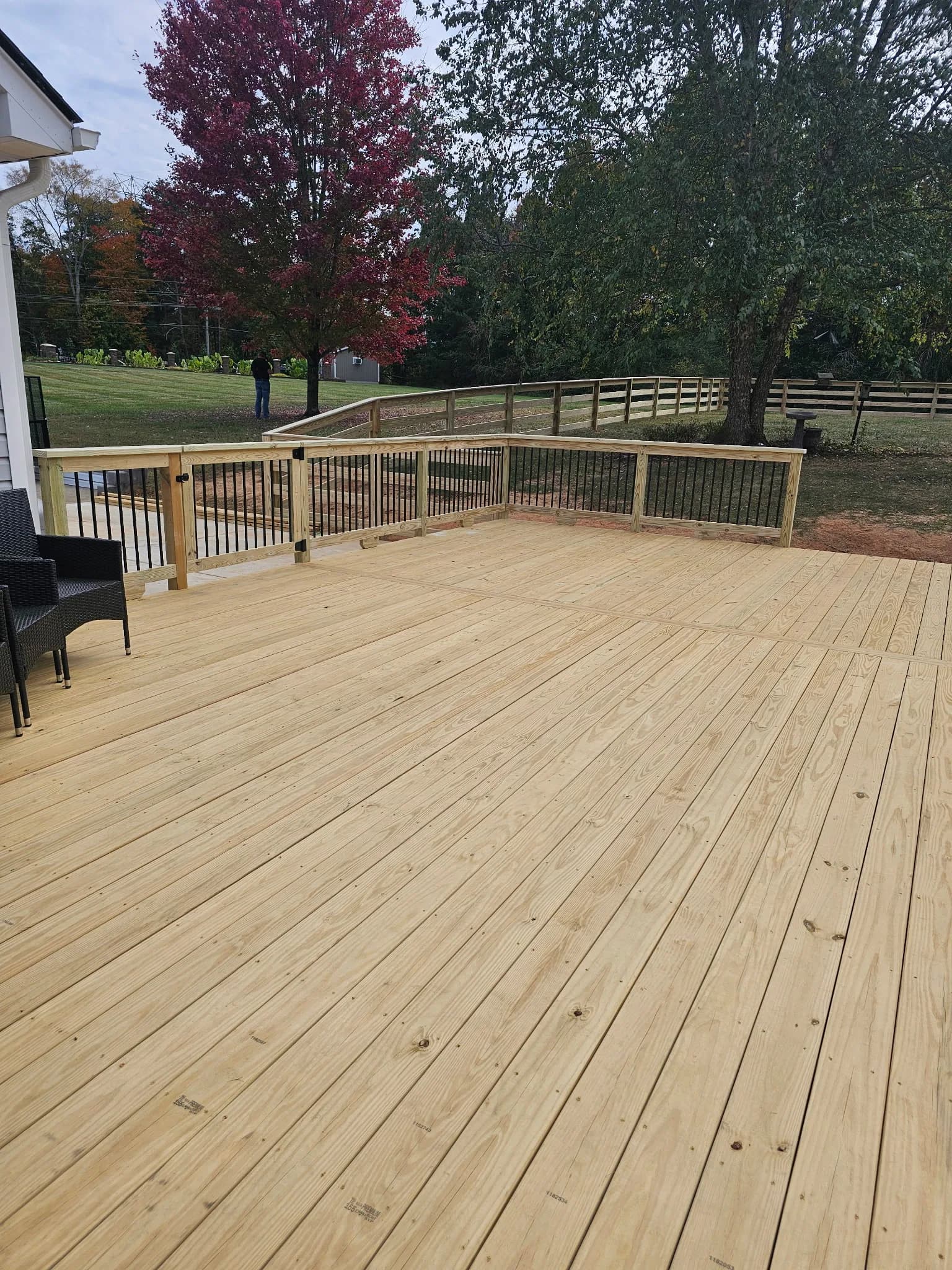 Finished wood deck built by Page Concrete and Outdoor Services