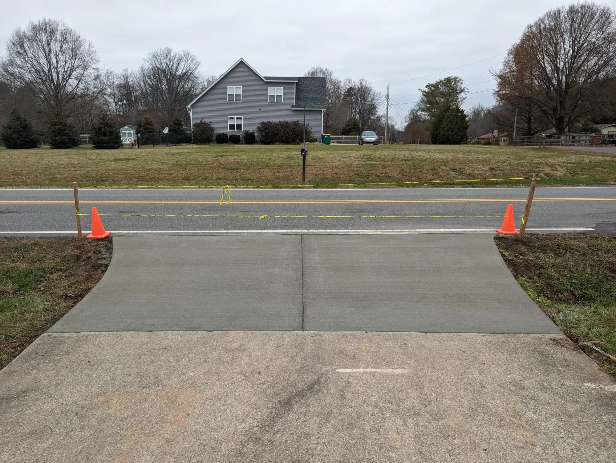 New concrete apron with a broom finish in Wallburg, NC