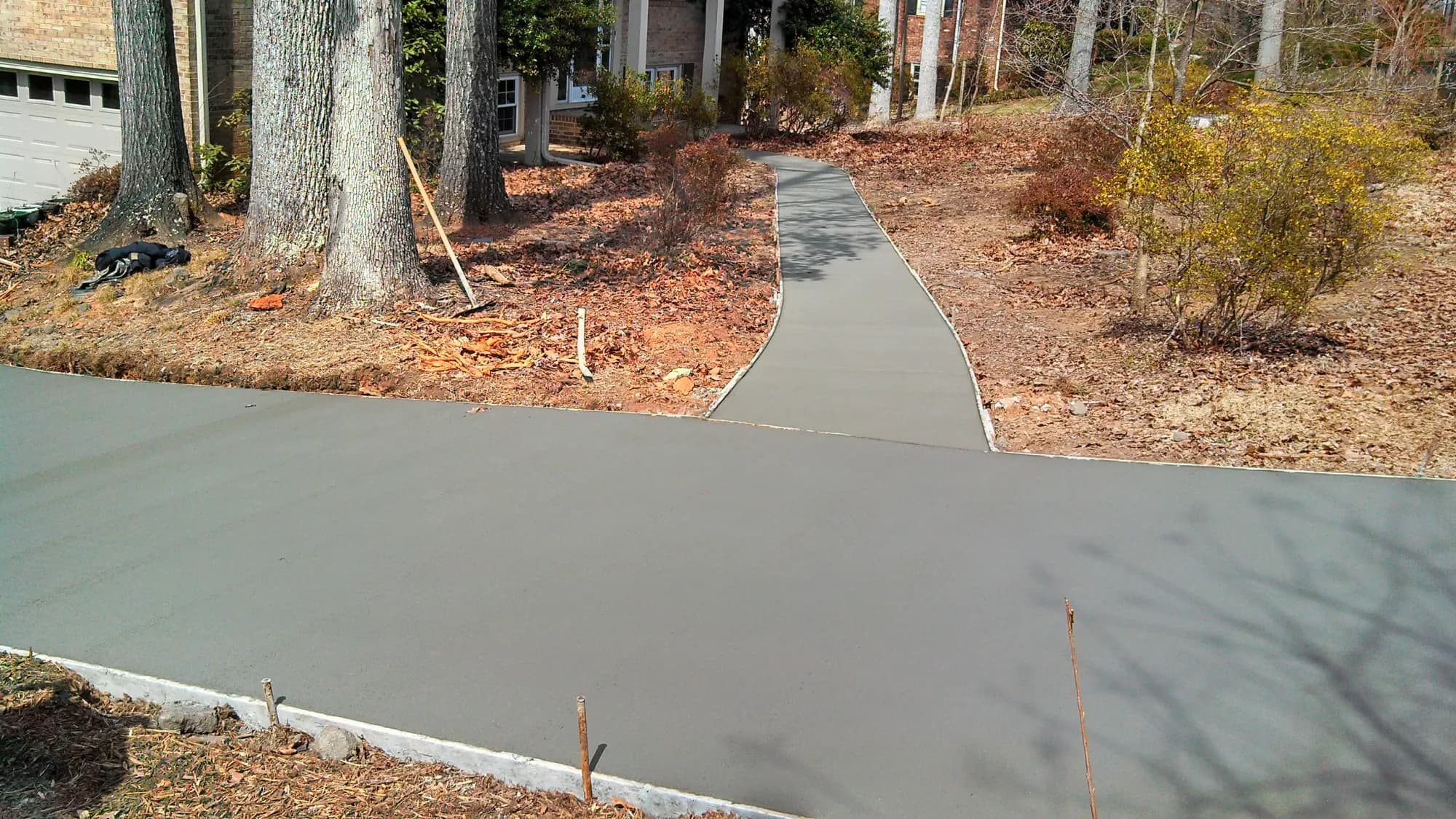 New concrete driveway and walkway with a broom finish in Winston-Salem, NC