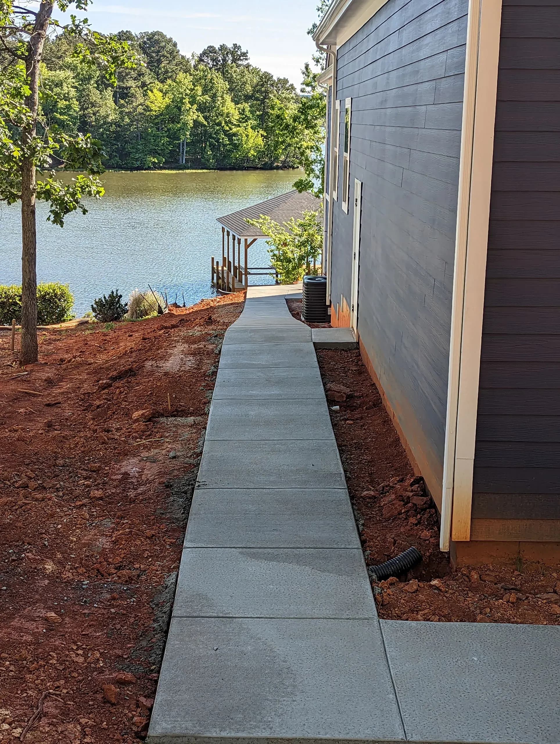 New concrete walkways and patio with a broom finish at Badin Lake, NC