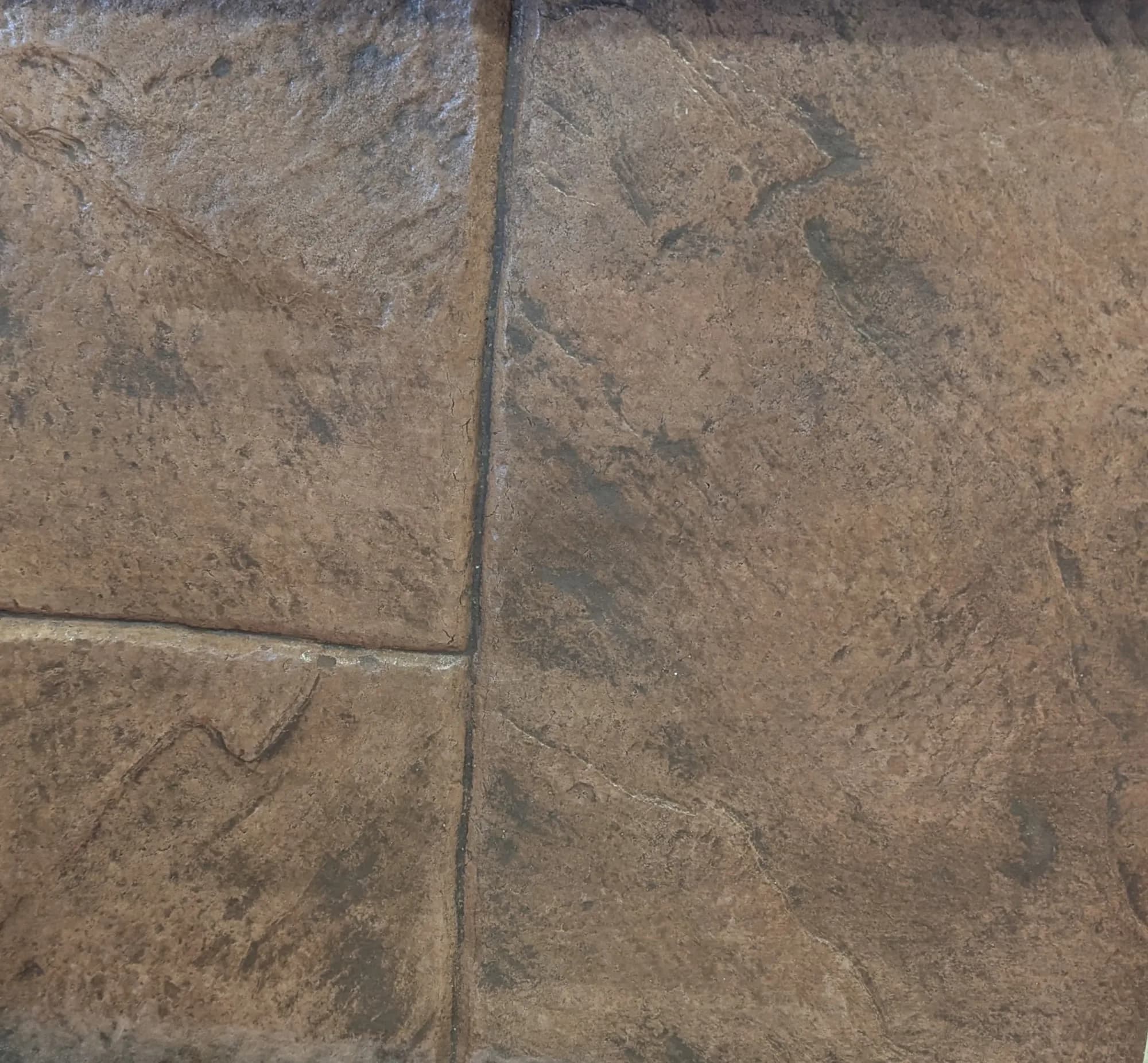 Large ashlar slate stamped concrete installed by Page Concrete