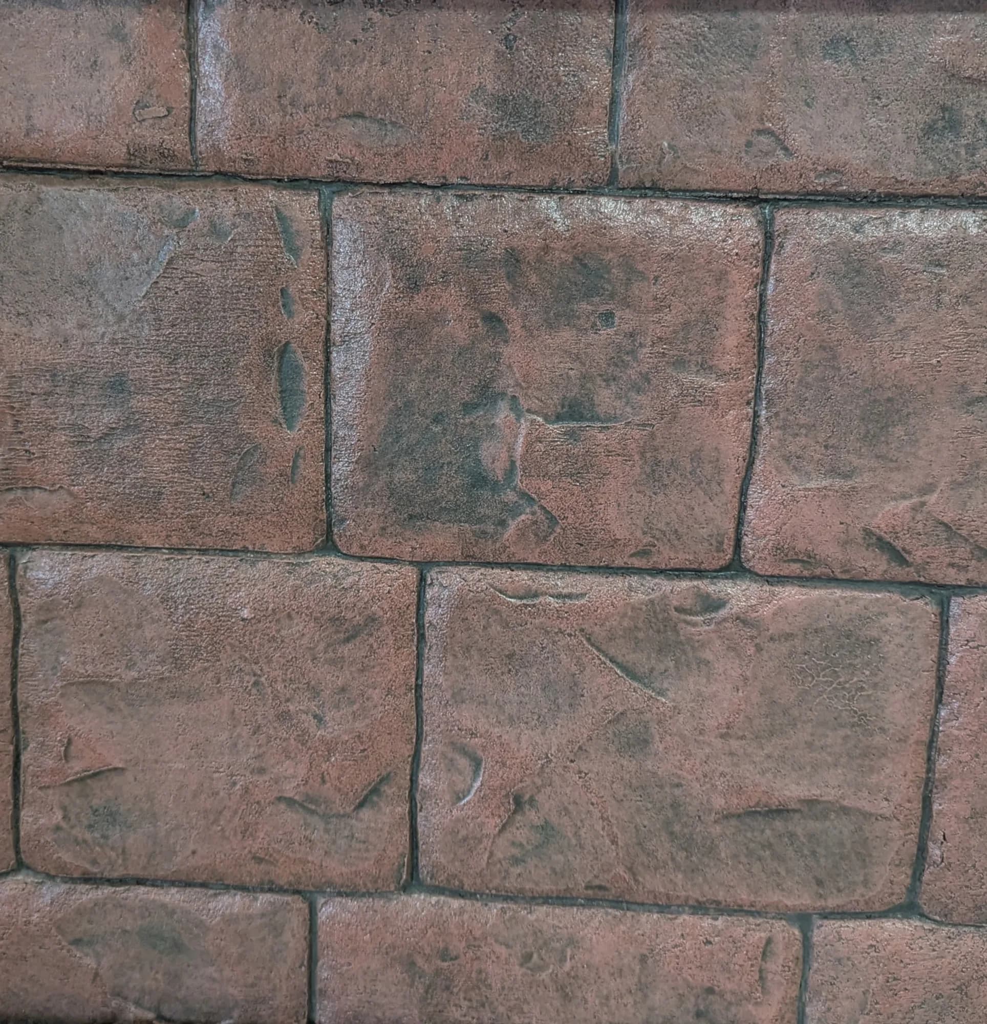 Old world cobblestone stamped concrete installed by Page Concrete