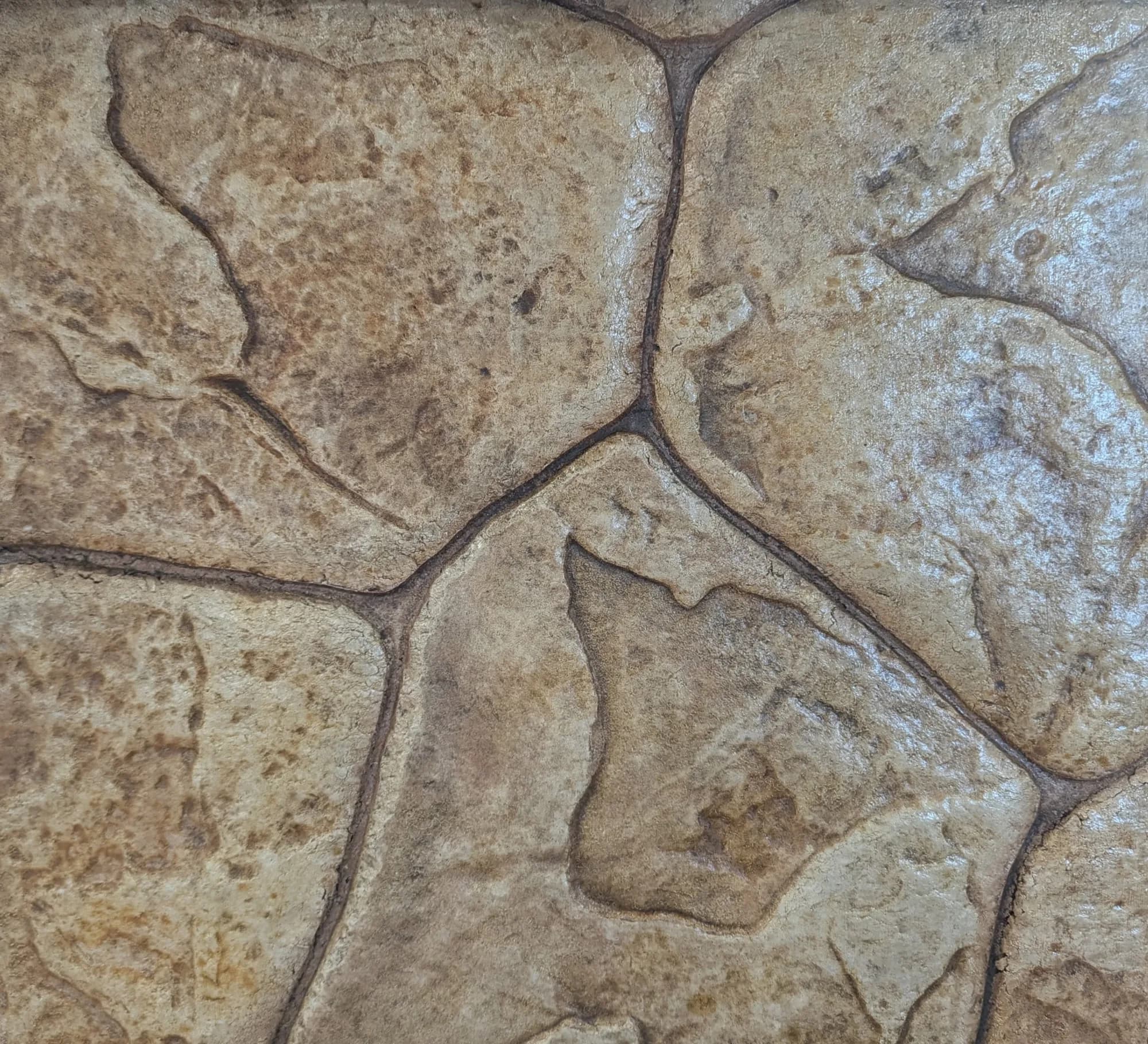 Random stone stamped concrete installed by Page Concrete
