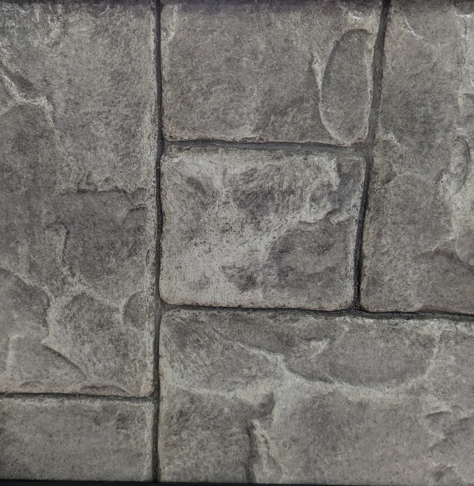 Small ashlar slate stamped concrete installed by Page Concrete