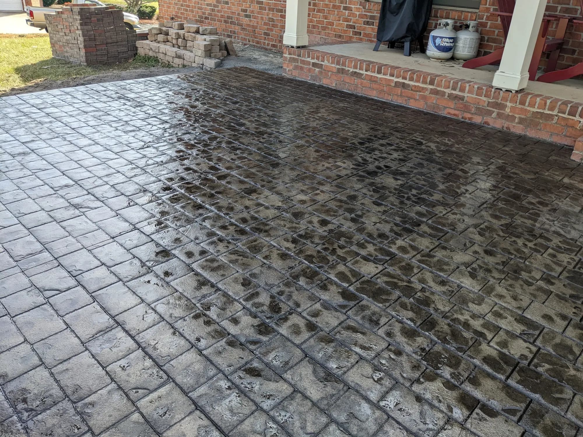 Old-world cobblestone stamped concrete patio in Kernersville, NC