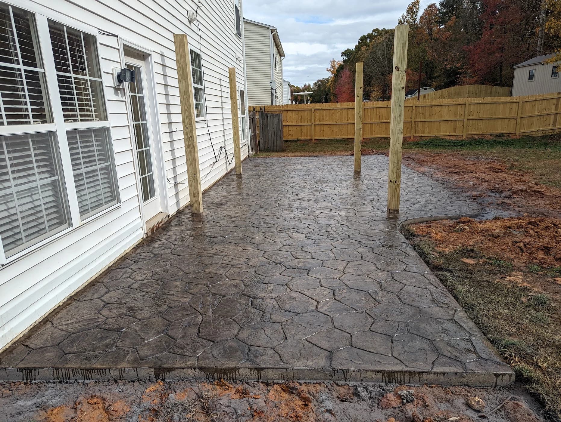 Random stone stamped concrete patio by Page Concrete in Jamestown, NC