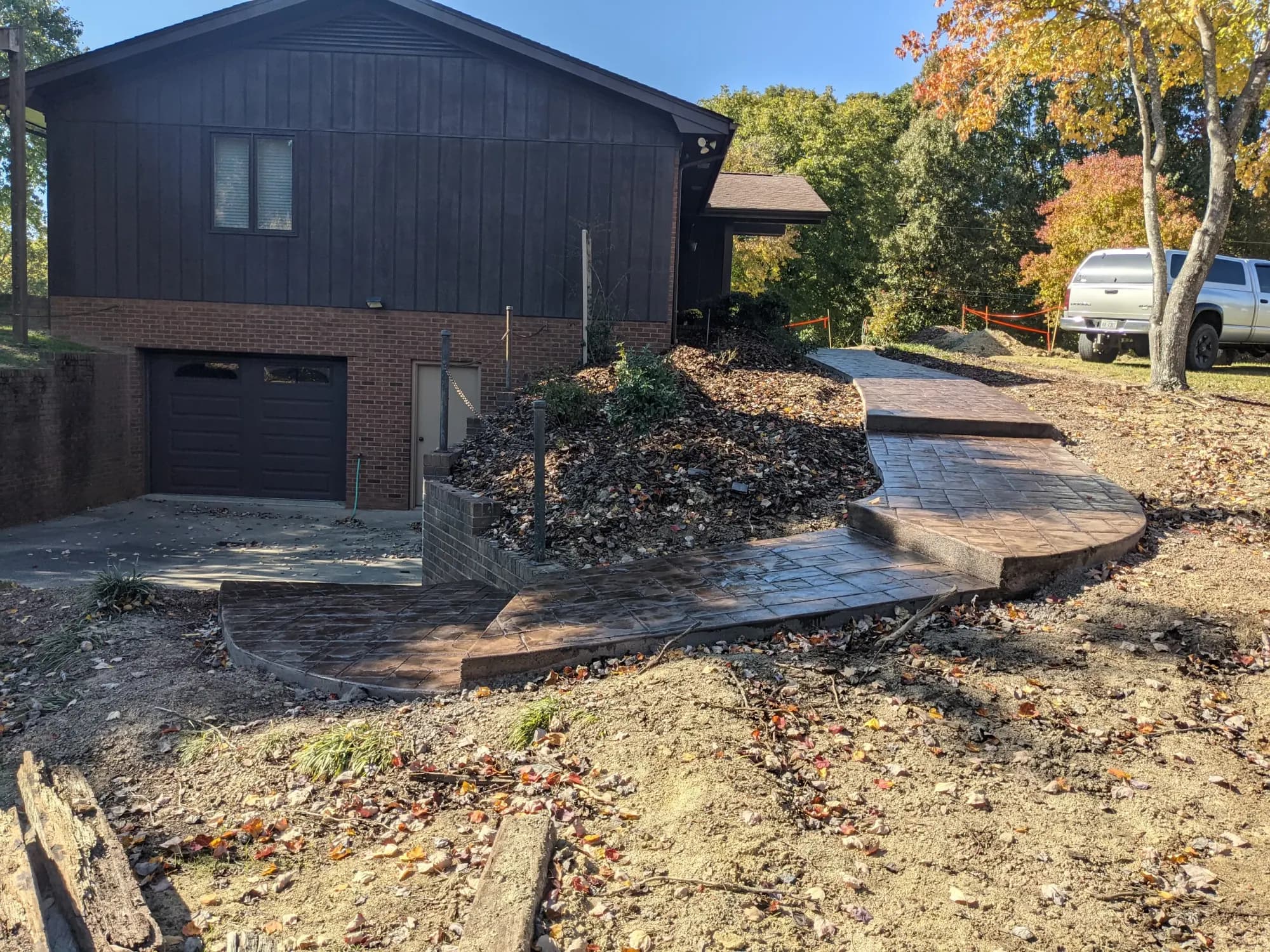 Small ashlar slate stamped concrete walkway with graduated steps in buff with dark gray release, High Point, NC